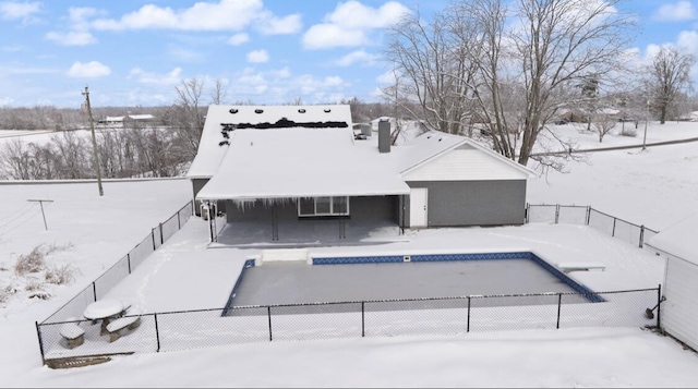 view of snow covered property