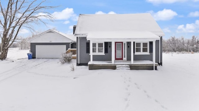 view of front facade with a garage and covered porch