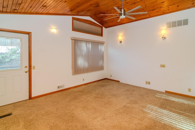 carpeted empty room with vaulted ceiling, wooden ceiling, and ceiling fan