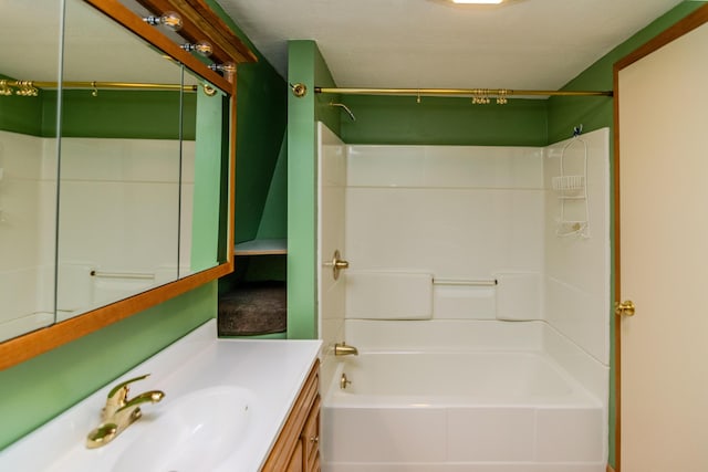 bathroom with shower / bathtub combination and vanity