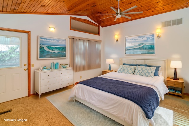 carpeted bedroom with ceiling fan, wood ceiling, and vaulted ceiling