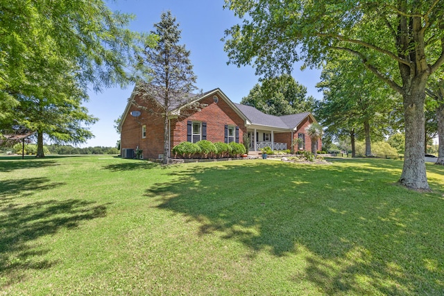 ranch-style house featuring a front yard