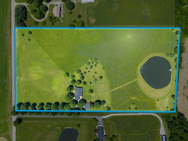 birds eye view of property featuring a rural view