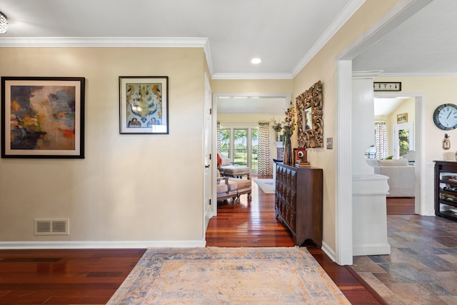 hallway featuring ornamental molding and dark wood-type flooring