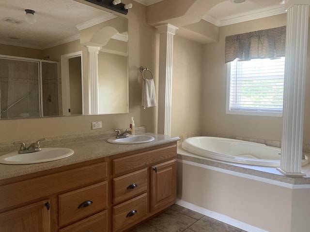 bathroom with vanity, tile patterned floors, ornamental molding, shower with separate bathtub, and ornate columns