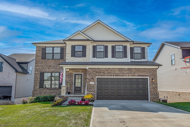 view of front facade with a garage and a front lawn