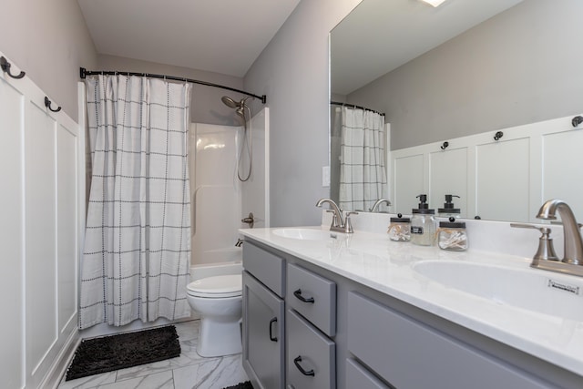 full bathroom with vanity, toilet, and shower / bath combo with shower curtain