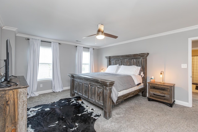 bedroom featuring ceiling fan, light colored carpet, and ornamental molding