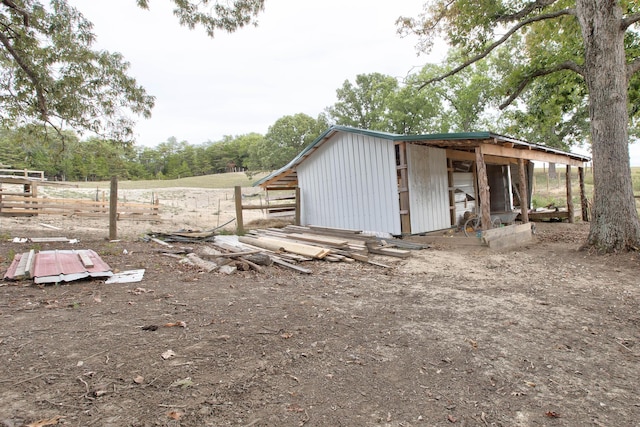 view of outdoor structure featuring a rural view