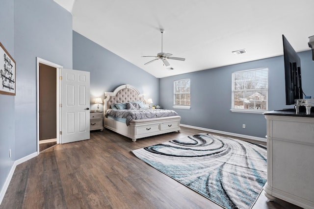 bedroom featuring high vaulted ceiling, dark wood-type flooring, and ceiling fan