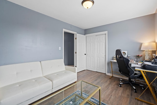 office with dark hardwood / wood-style floors