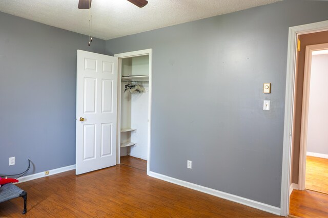 bathroom with shower / tub combo with curtain and toilet