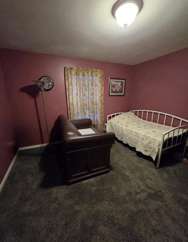 carpeted bedroom with baseboards