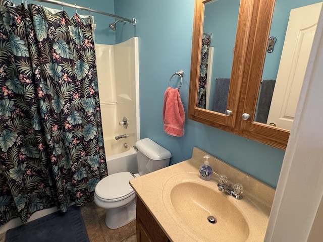 bathroom featuring shower / bath combination with curtain, vanity, toilet, and tile patterned floors