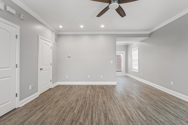 spare room with hardwood / wood-style floors, ceiling fan, and crown molding