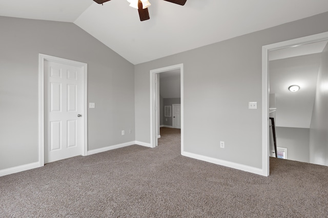 unfurnished bedroom featuring carpet flooring, ceiling fan, and lofted ceiling