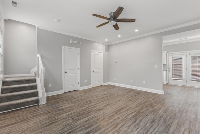 unfurnished living room with ceiling fan, crown molding, and dark wood-type flooring