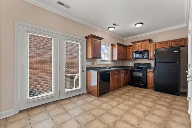 kitchen with light tile patterned flooring, black appliances, and ornamental molding