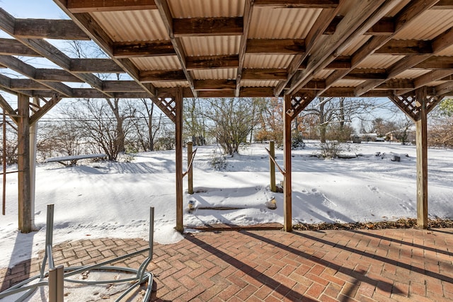 view of snow covered patio