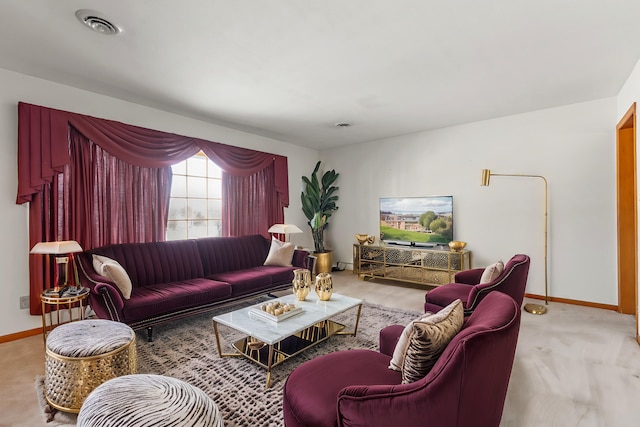 living room featuring light colored carpet