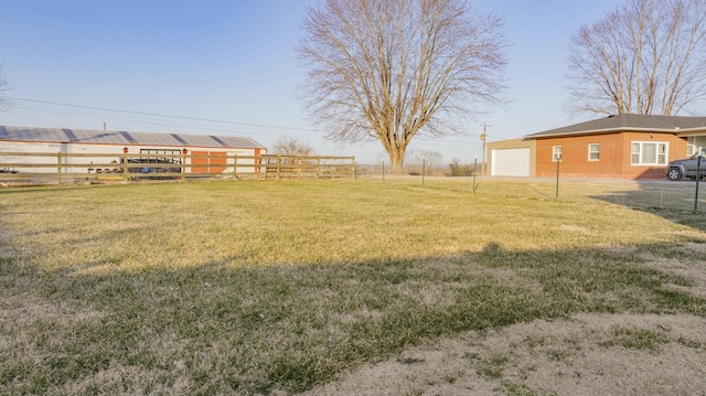 view of yard with an outdoor structure