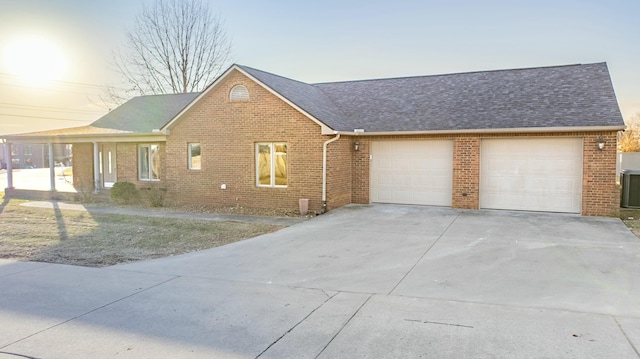 single story home with a garage