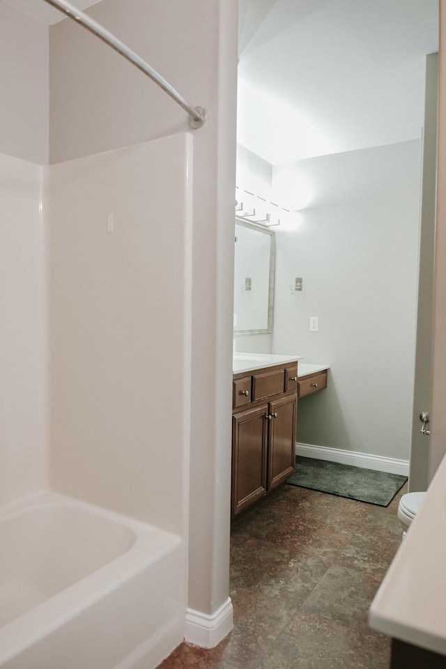 full bathroom with shower / bathtub combination, vanity, and toilet