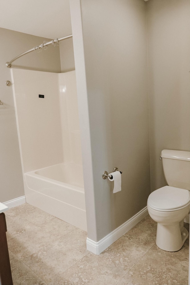 full bathroom featuring vanity, tile patterned floors, shower / bathtub combination, and toilet