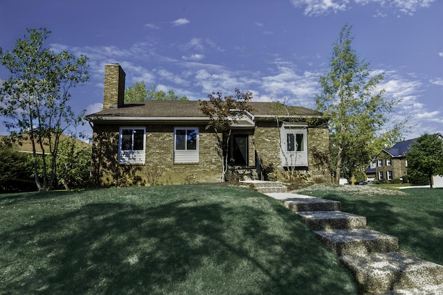 view of front of home with a front lawn