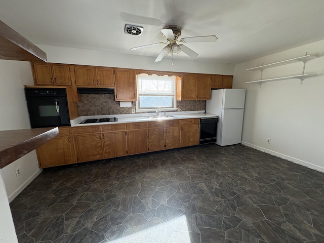 kitchen featuring sink, ceiling fan, tasteful backsplash, and black appliances