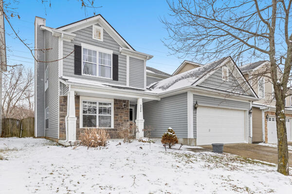 front of property with a garage