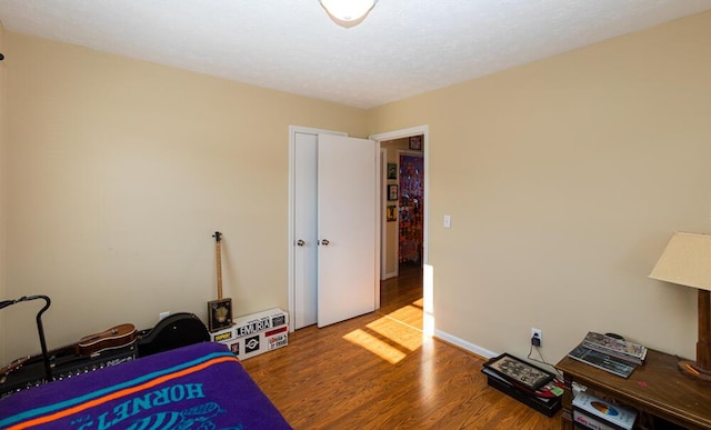 bedroom featuring hardwood / wood-style floors