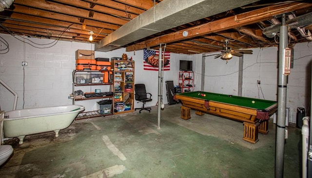 basement with ceiling fan and billiards