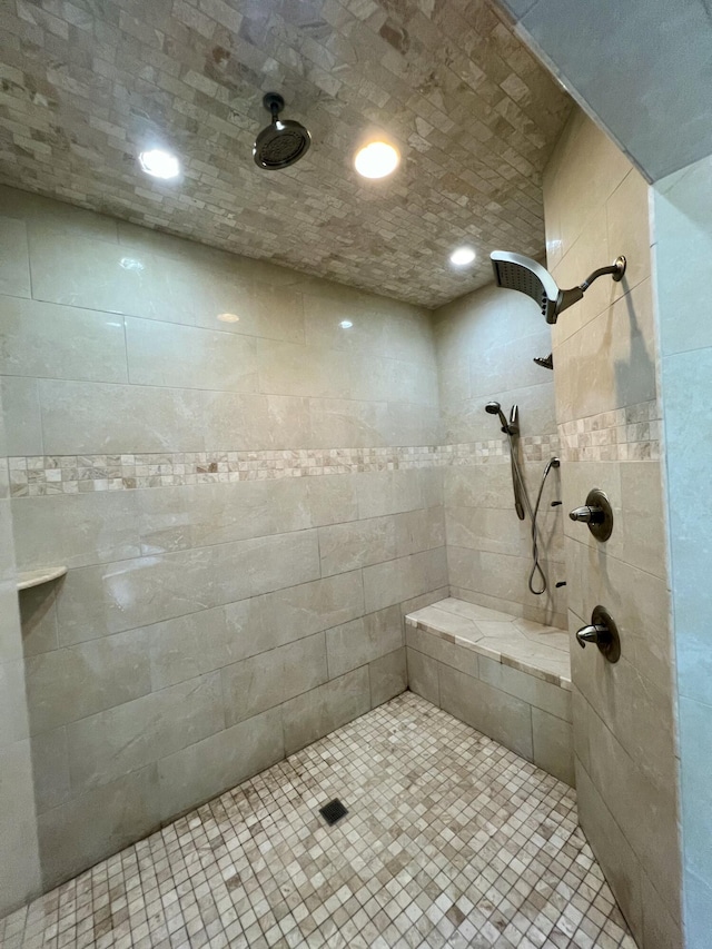 bathroom featuring a tile shower