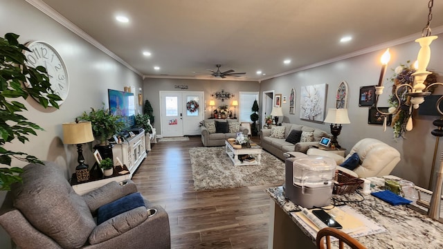 living room with ceiling fan, dark wood-type flooring, french doors, and crown molding