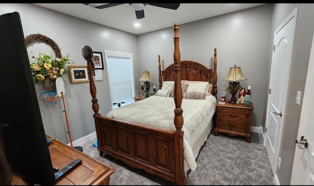 bedroom with ceiling fan and carpet