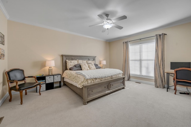 bedroom with ceiling fan, crown molding, and light colored carpet