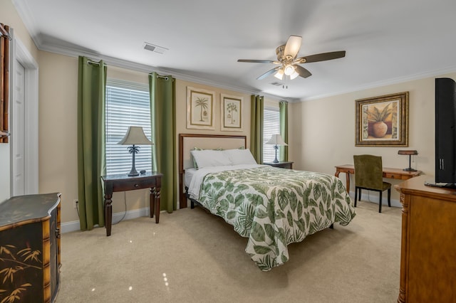 bedroom featuring light carpet, multiple windows, ceiling fan, and crown molding