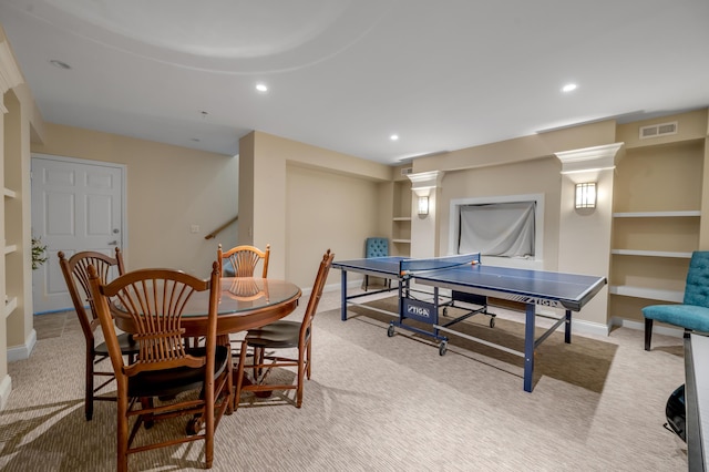 playroom featuring light colored carpet