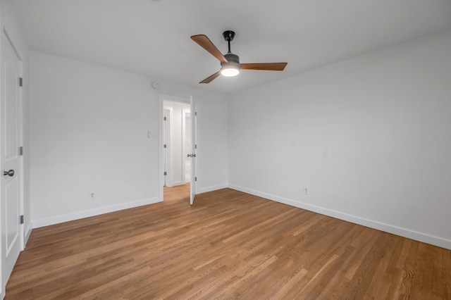 unfurnished bedroom featuring ceiling fan and light hardwood / wood-style flooring