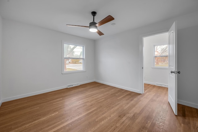 unfurnished room featuring ceiling fan and light hardwood / wood-style floors