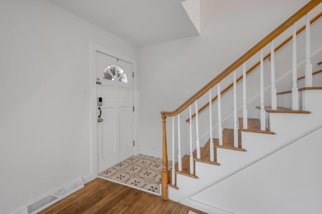 foyer with hardwood / wood-style floors