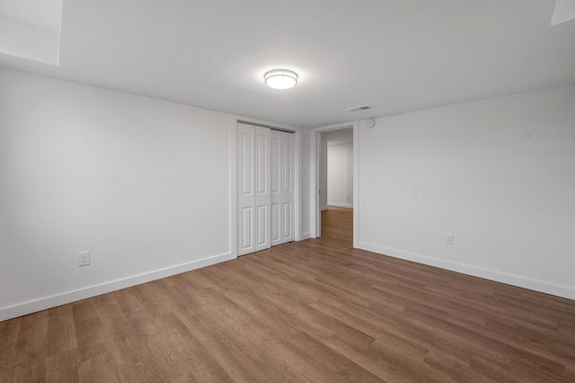 empty room featuring hardwood / wood-style floors