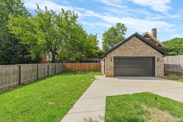 view of yard featuring a garage