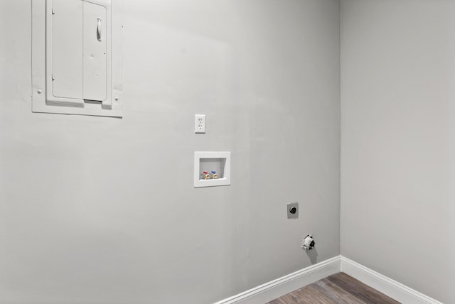 washroom with washer hookup, hardwood / wood-style flooring, electric dryer hookup, and electric panel