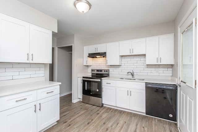 kitchen with white cabinetry, electric range, dishwasher, sink, and light wood-type flooring