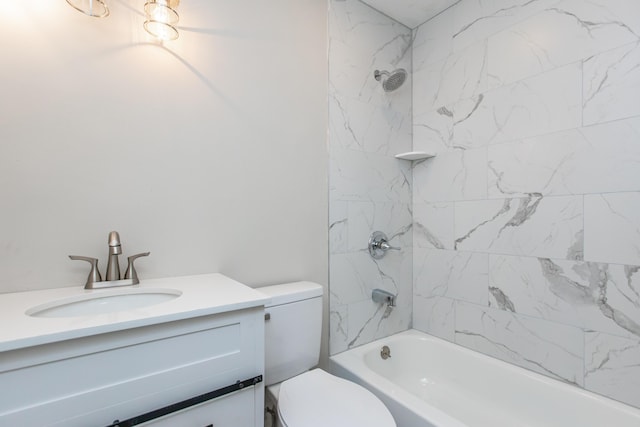 full bathroom with vanity, toilet, and tiled shower / bath combo