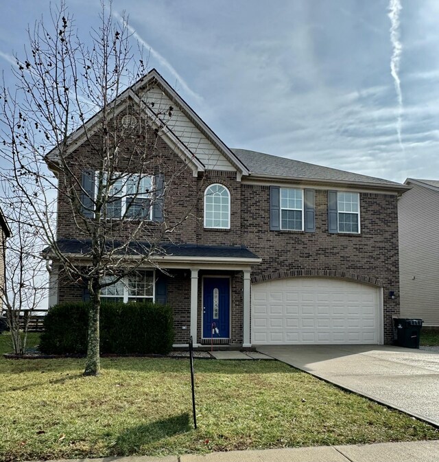 front of property featuring a garage