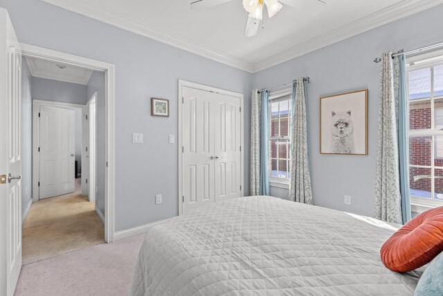 bedroom featuring light carpet, multiple windows, and ornamental molding