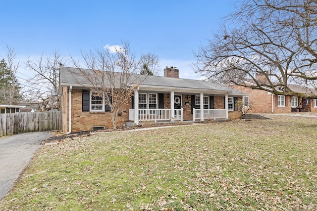 single story home featuring a porch and a front yard